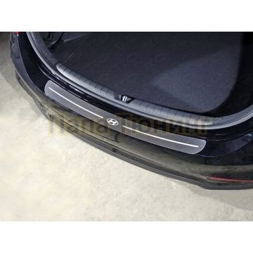 Накладка на задний бампер (лист шлифованный логотип Hyundai) ТСС для Hyundai Accent 2017- Накладка на задний бампер (лист шлифованный логотип Hyundai) ТСС для Hyundai Accent 2017-