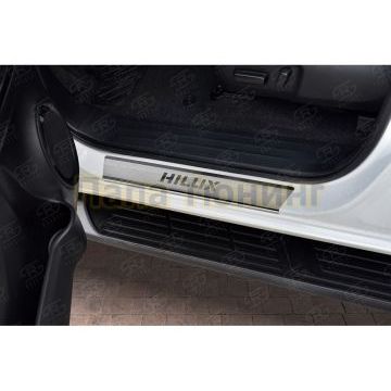 Накладки на пороги RUSSTAL (нерж., шлиф., надпись) RUSSTAL для Toyota Hilux Black Onyx 2020-