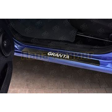 Накладки на пороги RUSSTAL (нерж., карбон, надпись) для Lada Granta 2011-