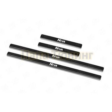 Накладки на пороги RUSSTAL (нерж., карбон, надпись) для Lada Niva Travel 2021-