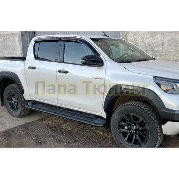 Защита штатного порога с покрытием «раптор» d42 Папа Тюнинг для Toyota Hilux Black Onyx 2020-
