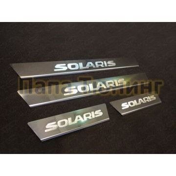 Накладки на пороги зеркальный лист с логотипом ТСС для Hyundai Solaris 2014-2017